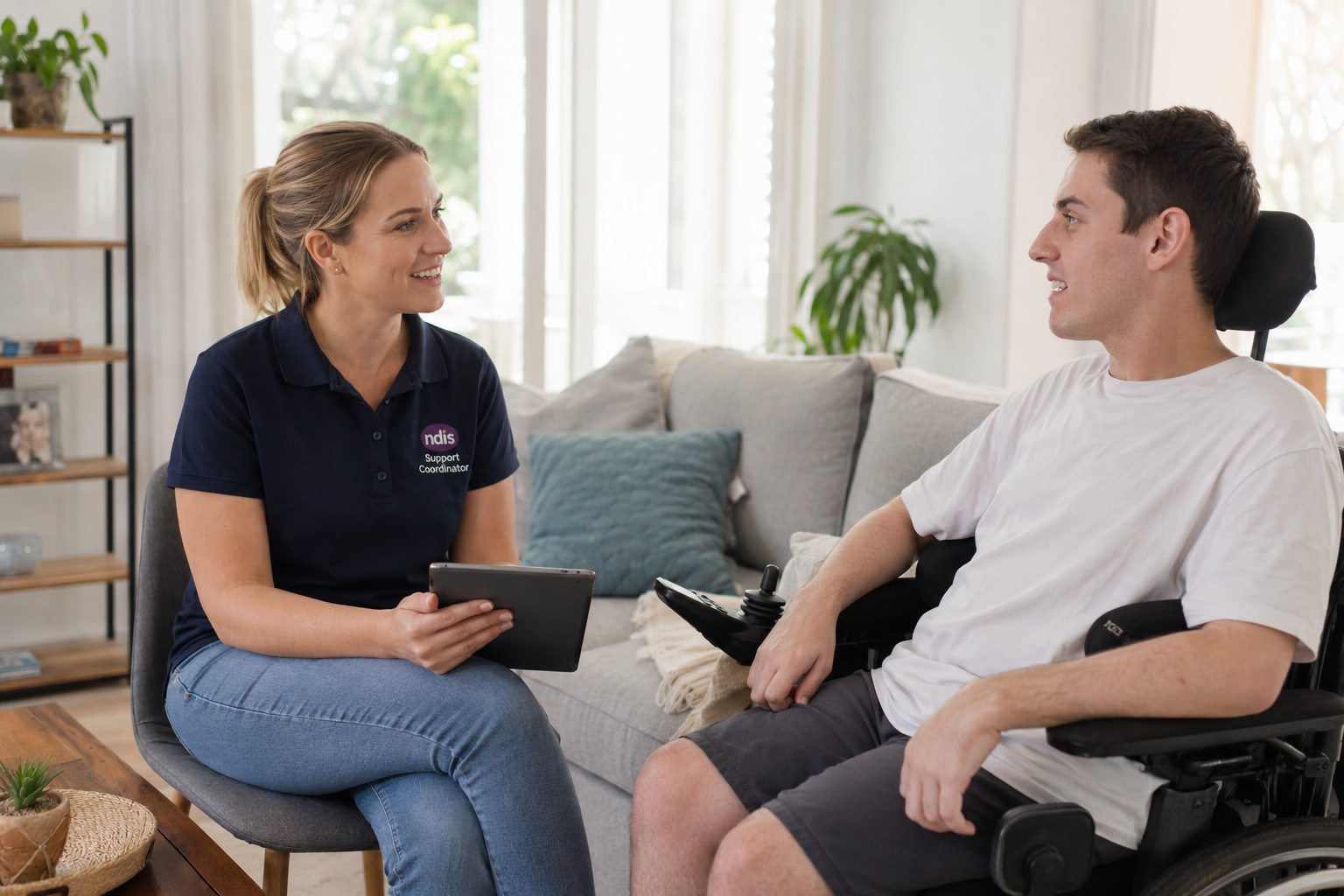 A human NDIS support coordinator meeting taking place in an Australian home